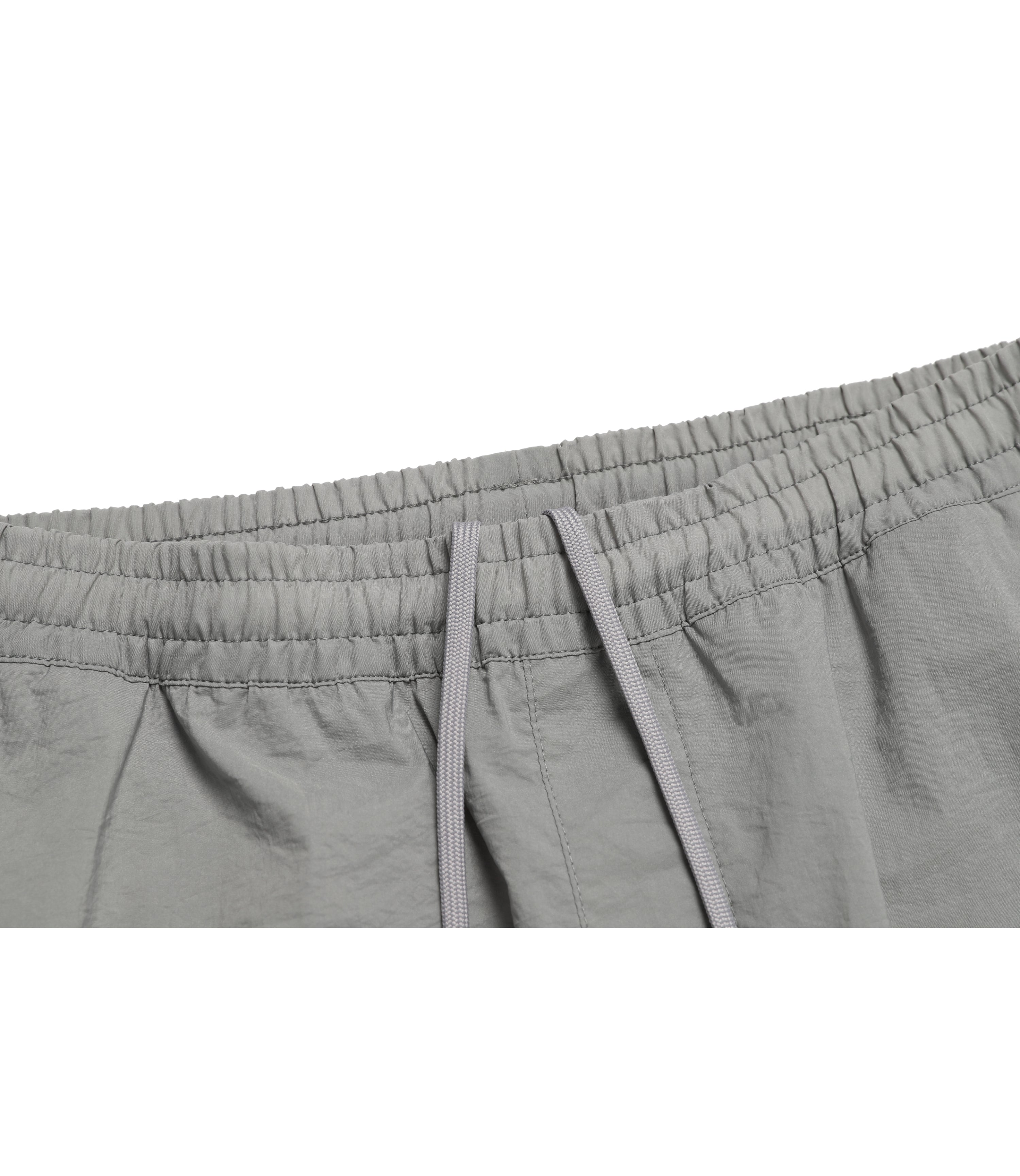 Unisex DIMER Woven Training Tapered Pants<br>STONE GREY