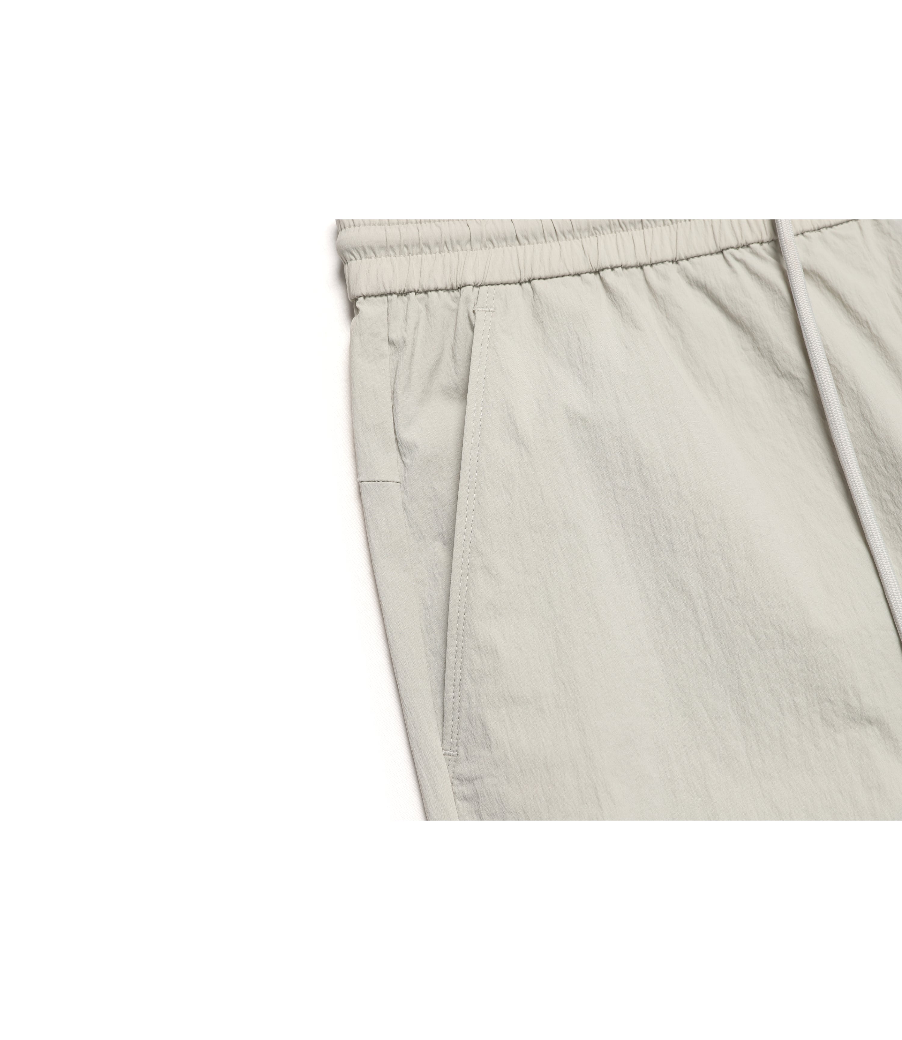 Women’s CYGNUS Woven Stretch Jogger Pants<br>MOURNING BEIGE