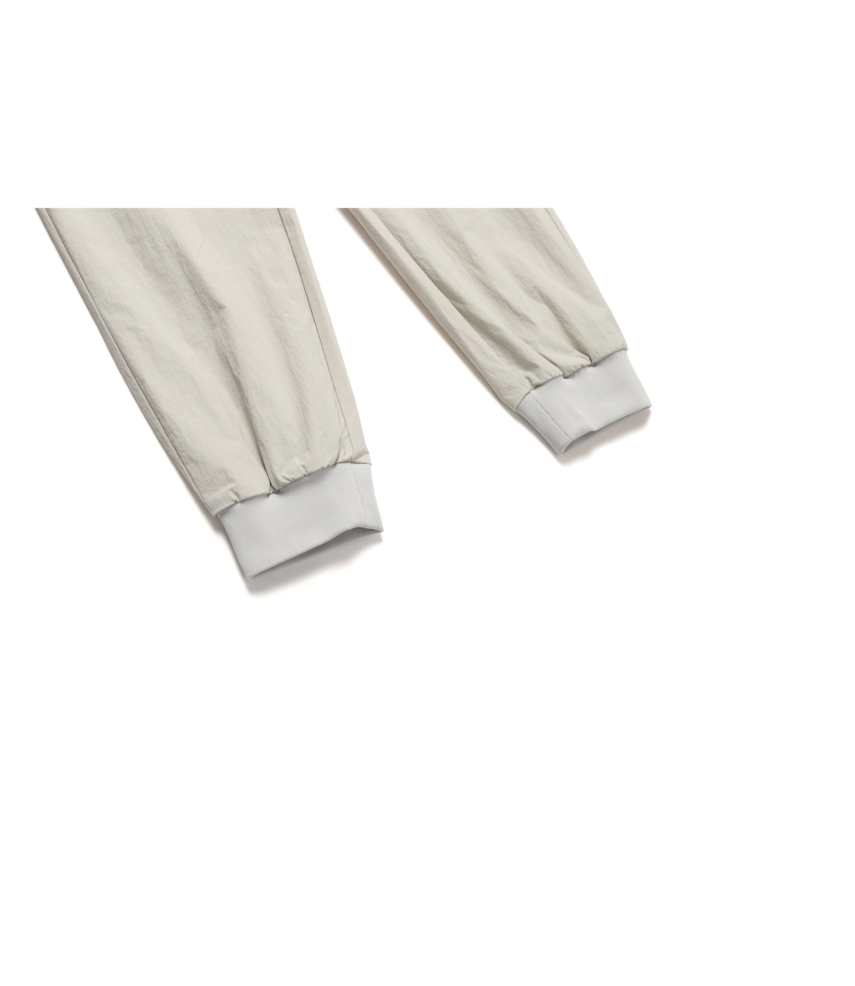 Women’s CYGNUS Woven Stretch Jogger Pants<br>MOURNING BEIGE