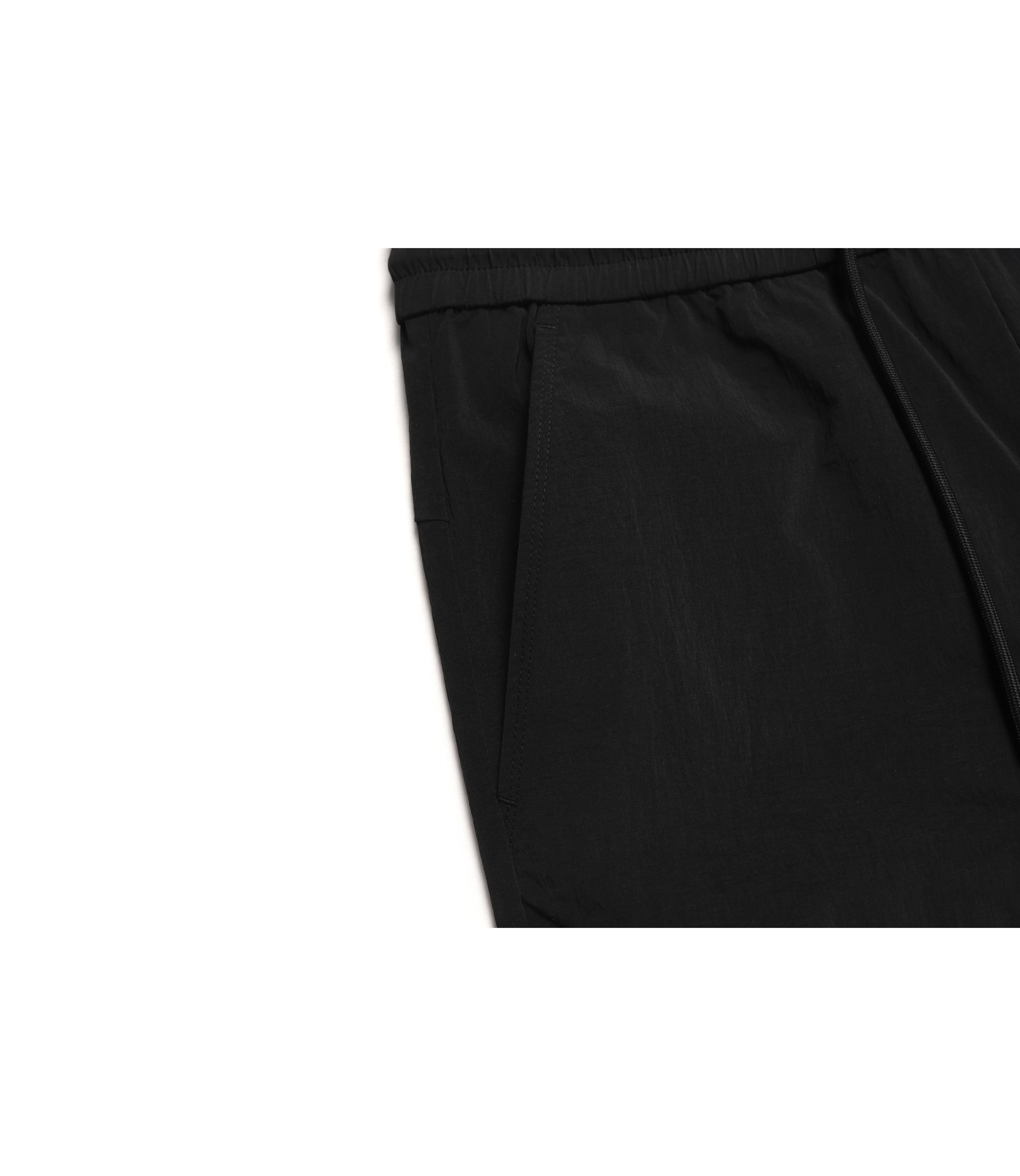 Women’s CYGNUS Woven Stretch Jogger Pants<br>CARBON BLACK